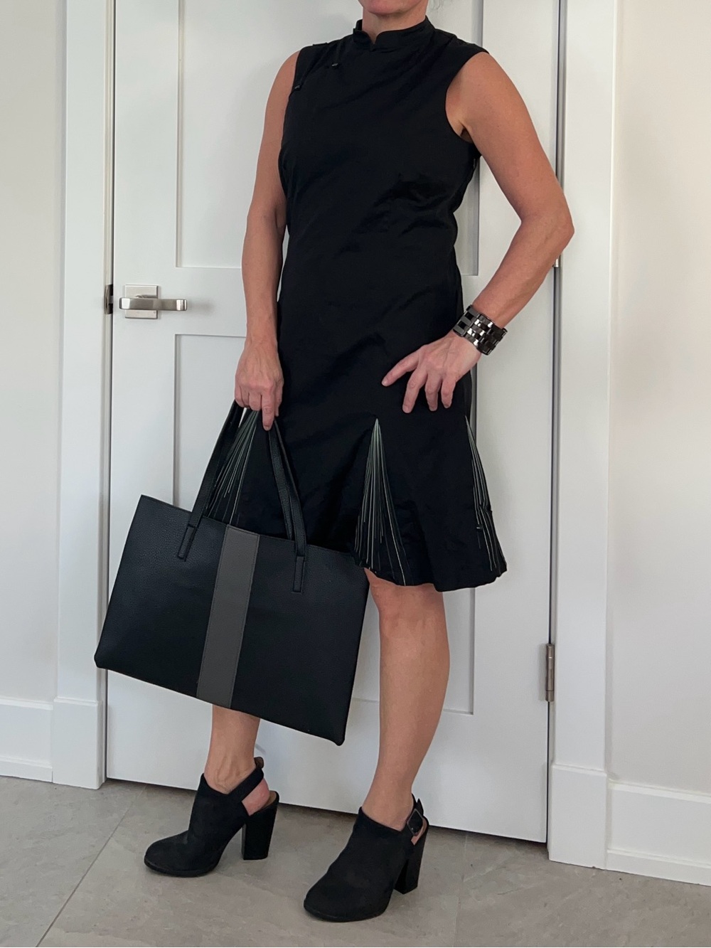 Sleeveless Black A-Line Dress with Pleated Inset Panels